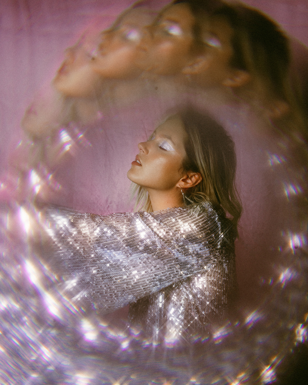 Shallow Focus Photo of Woman in Silver Top